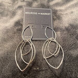 Flirty single silver earrings